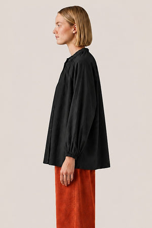 Pantalon velours côtelé brique, vue de profil