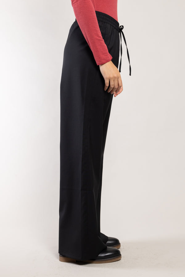 Pantalon Rundu laine écoresponsable noir Elemente Clemente, taille élastiquée avec lien vue de profil